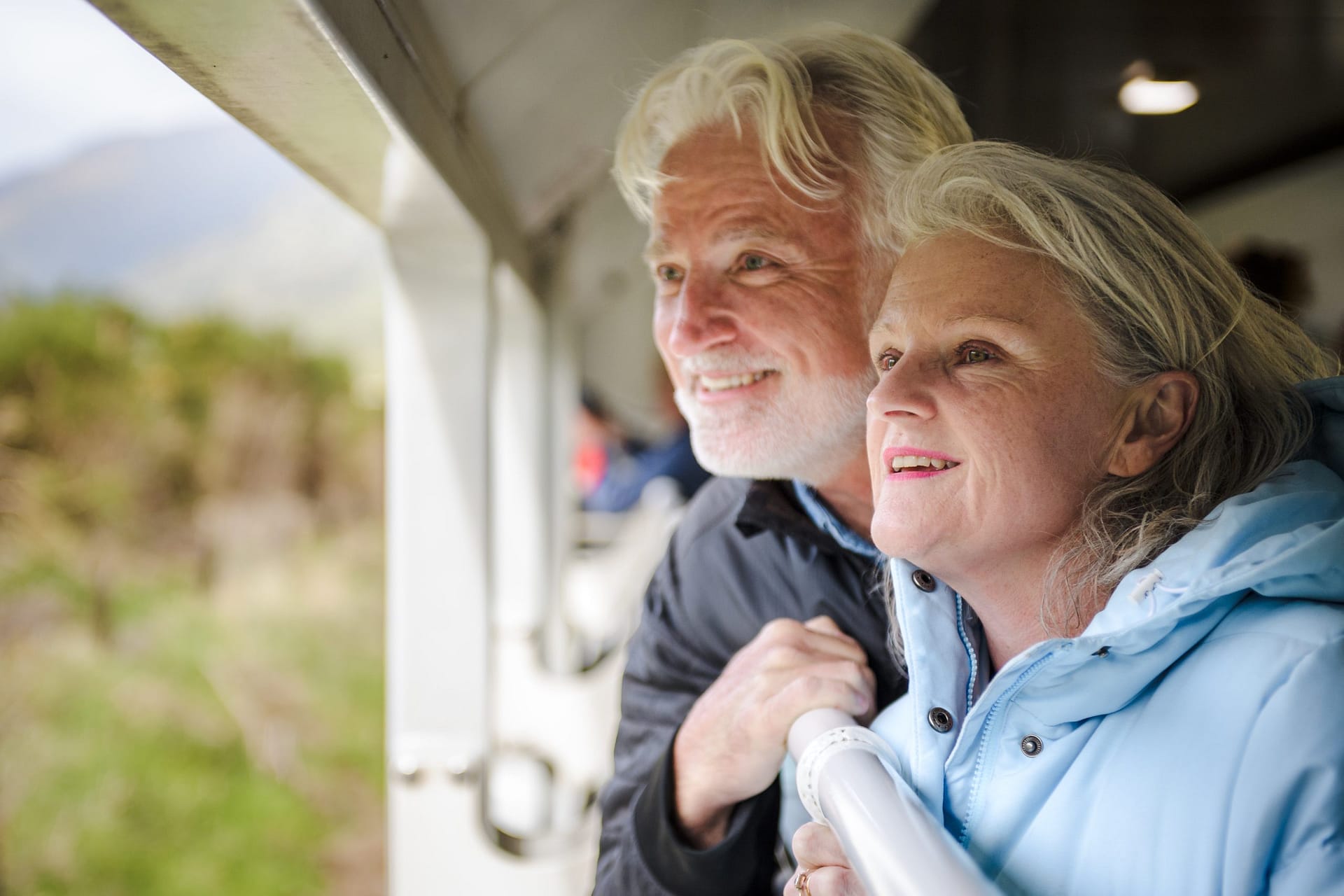 Couple in Open-Air Carriage - TranzAlpine
