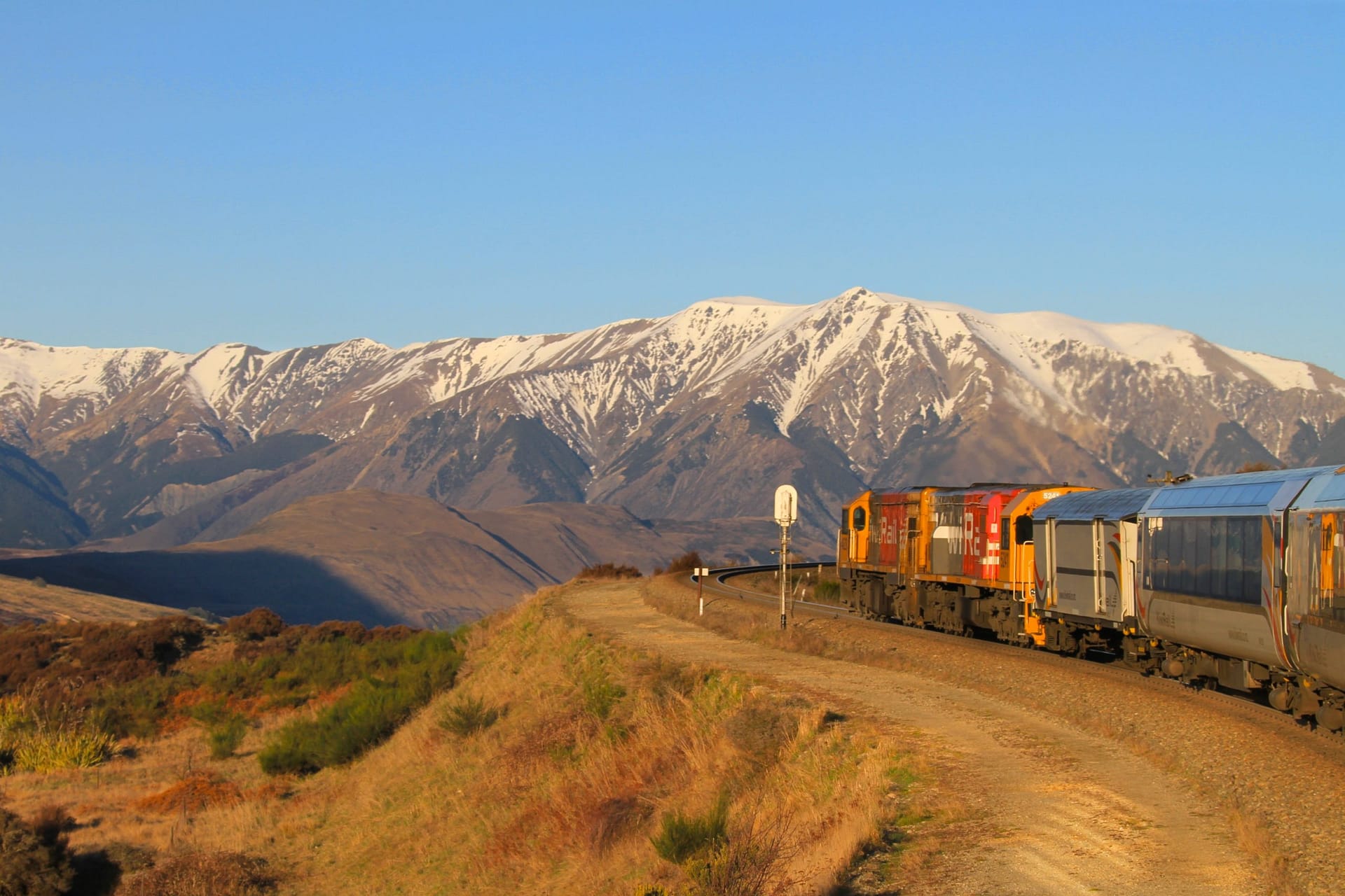 Tranzalpine with snowy mountains