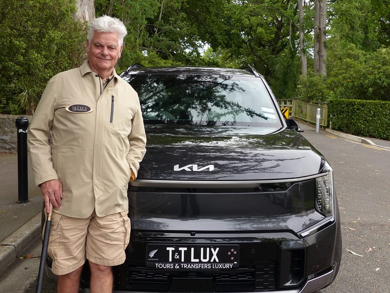 Stu in front of Kia with Cane